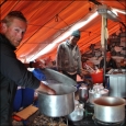 Jimmy Carrol getting some hot water from the cook tent